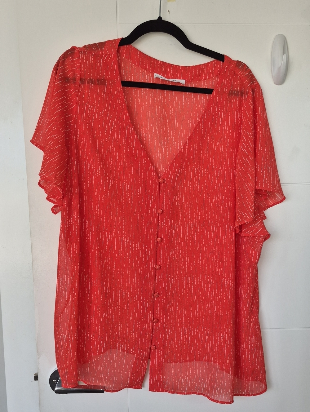 In Every Story Red/orange Sheer V-Neck Button Front Blouse with Ruffle Sleeves
